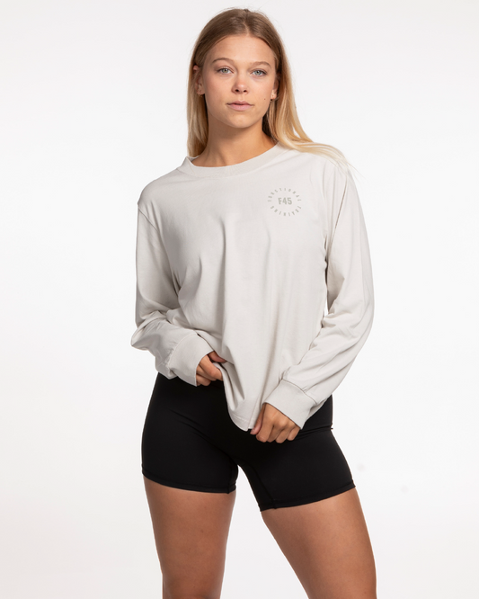 The Womens Heavyweight Long Sleeve - Washed Bone - Seasonal - Left Chest Stacked & Back Stacked - Tone on Tone